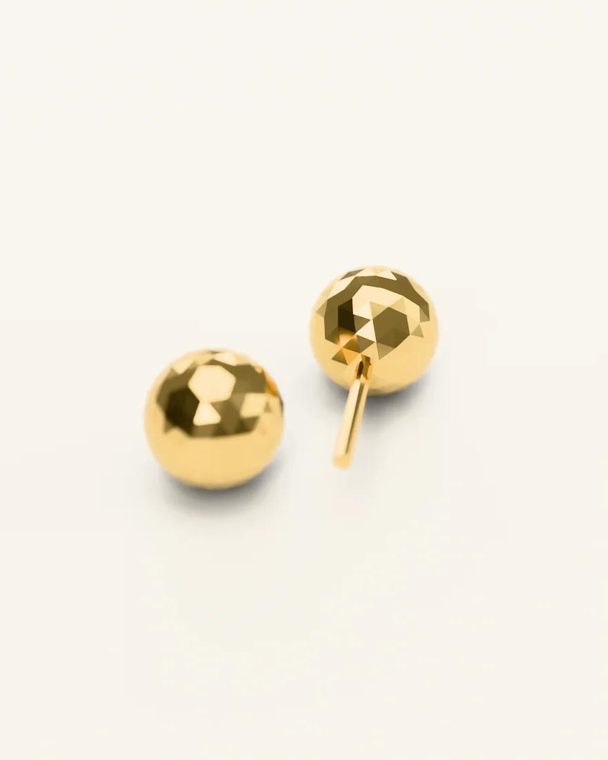 Pair of faceted gold ball stud earrings