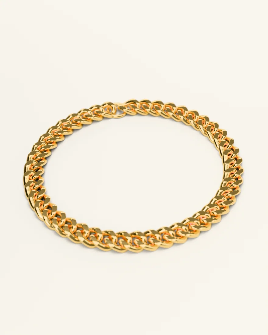 Gold curb-link bracelet laid in a circle